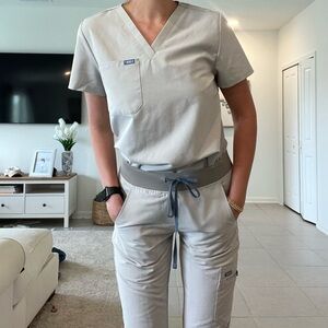 Grey scrubs set. Brand: Code Nxt.